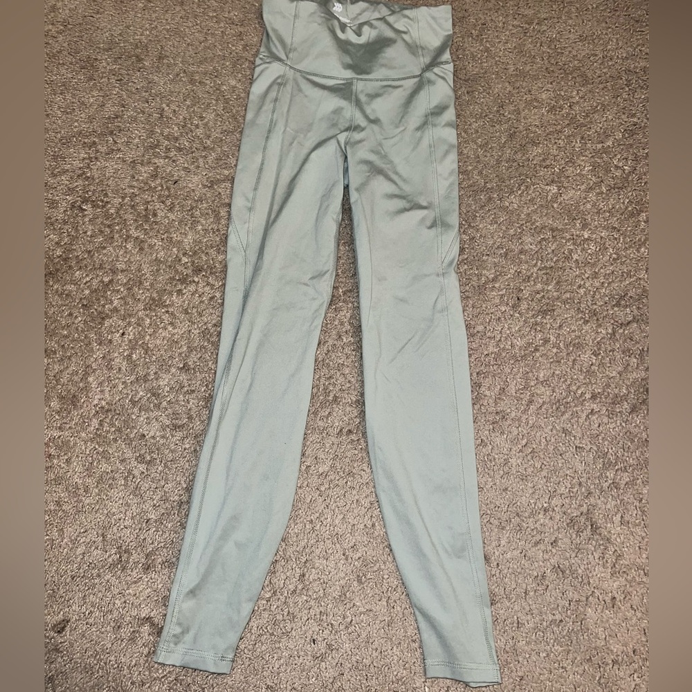 Green leggings, size XS